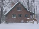 Back view of Alpine Snow Cabin in Gaylord Michigan.