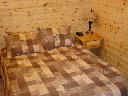 Bedroom on lower walkout level of Alpine Snow Cabin.